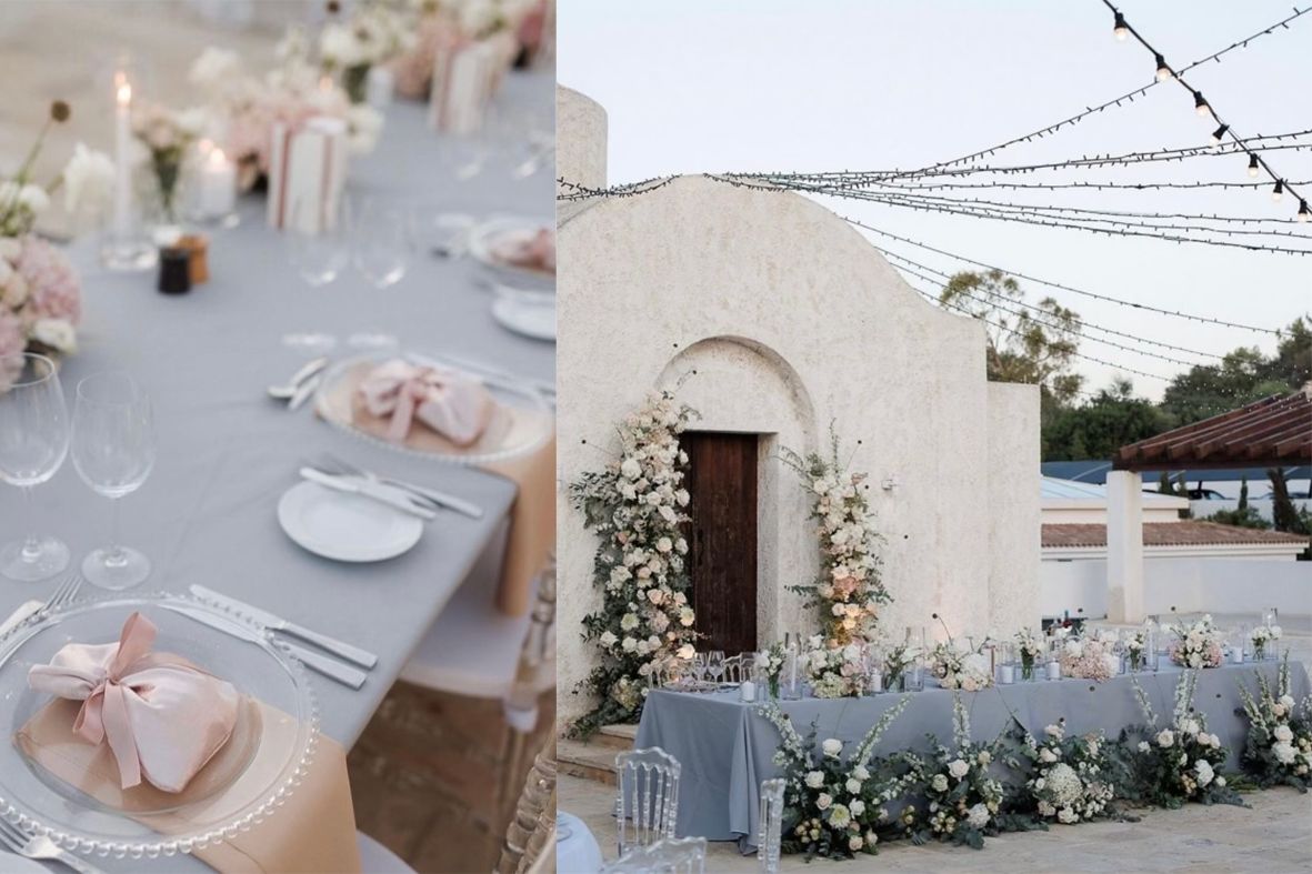 Long wedding table in grey linen with blush ribbons in front of a whitewashed Cypriot chapel